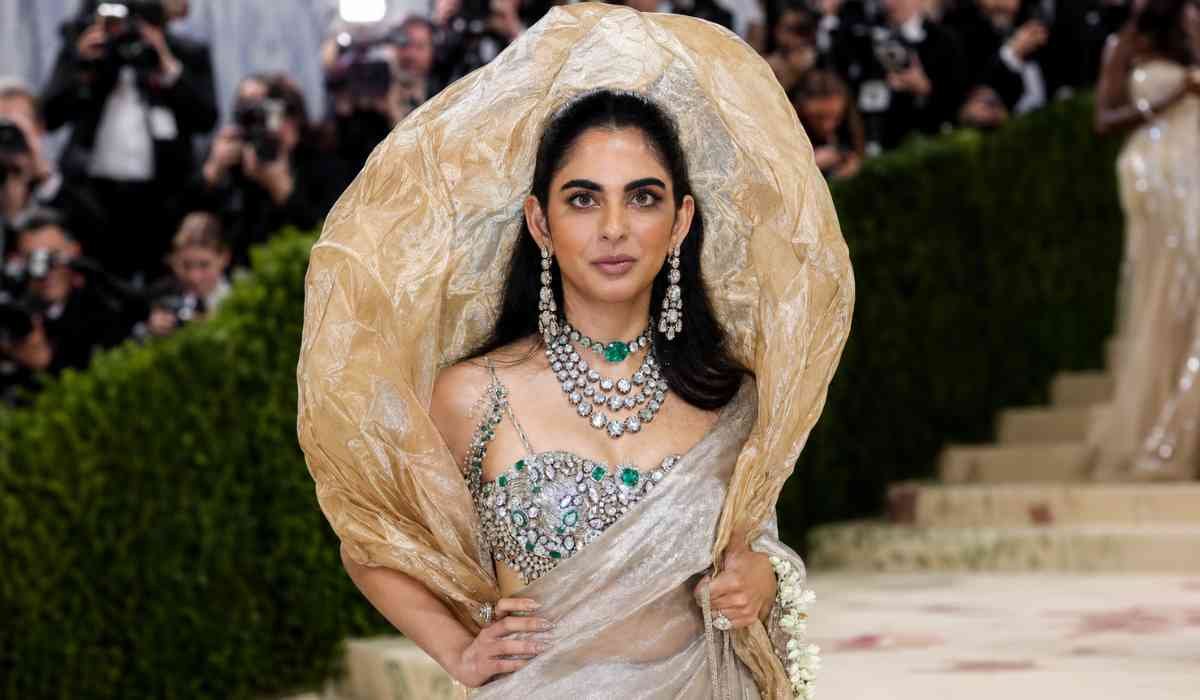 Isha Ambani MET Gala 2026 showing royal couture look with diamond and emerald jewellery on red carpet