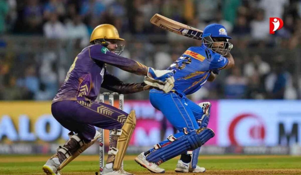 ईडन गार्डन्स स्टेडियम में आईपीएल 2026 के KKR vs MI मुकाबले का पोस्टर, जिसमें दोनों टीमों के खिलाड़ी आमने-सामने खड़े हैं।