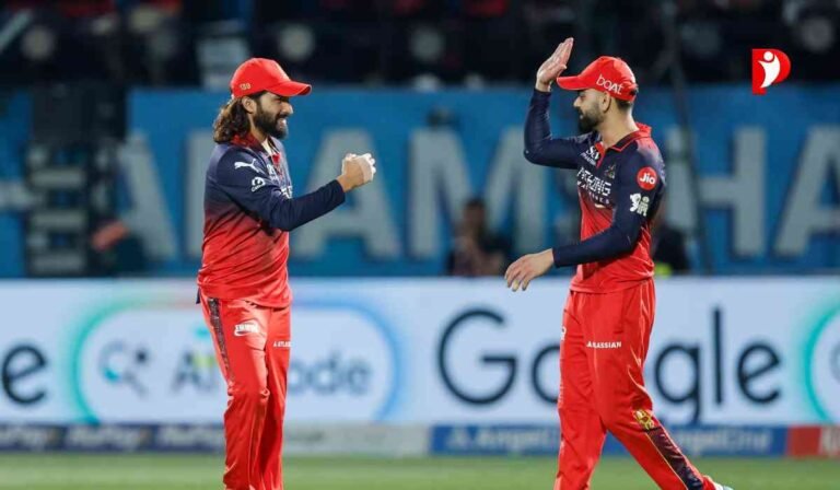 RCB Vs GT Qualifier 1 IPL 2026: रजत पाटीदार की कप्तानी में RCB ने रचा इतिहास, गुजरात को 92 रन से हराकर फाइनल में एंट्री 4 RCB Vs GT Qualifier 1 IPL 2026 को दर्शाती हाई-क्वालिटी इमेज जिसमें रजत पाटीदार और विराट कोहली गुजरात टाइटंस के खिलाफ शानदार जीत के बाद जश्न मनाते दिखाई दे रहे हैं।